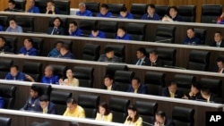 Lawmakers attend a debate before a vote to select the new prime minister at the Parliament in Bangkok, Thailand, Aug. 16, 2024.