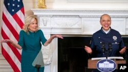 Guest chef Nina Curtis, right, speaks next to first lady Jill Biden, during a media preview, June 21, 2023, at the White House.