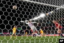 Spain's goalkeeper Cata Coll receives a goal by Sweden's Rebecka Blomqvist during the Women's World Cup semifinal soccer match between Sweden and Spain at Eden Park in Auckland, New Zealand, Aug. 15, 2023.