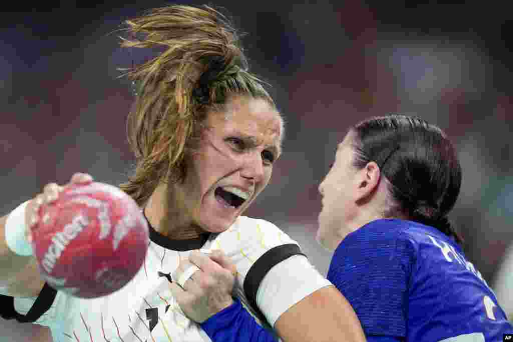 Germany&#39;s Xenia Smits is in action during a quarterfinal handball match between France and Germany at the 2024 Summer Olympics in Villeneuve-d&#39;Ascq, France.