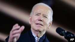 FILE - US President Joe Biden speaks about his economic agenda at the Wisconsin Black Chamber of Commerce, Dec. 20, 2023, in Milwaukee. 