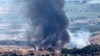 Smoke billows after a hit from a rocket fired from southern Lebanon over the Upper Galilee region in northern Israel on July 21, 2024, amid ongoing cross-border clashes between Israeli troops and Lebanon's Hezbollah fighters. 