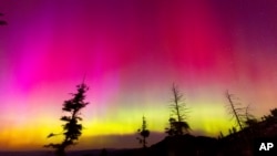 The Northern lights fill the sky at the Bogus Basin ski resort in Boise, Idaho, May 11, 2024.