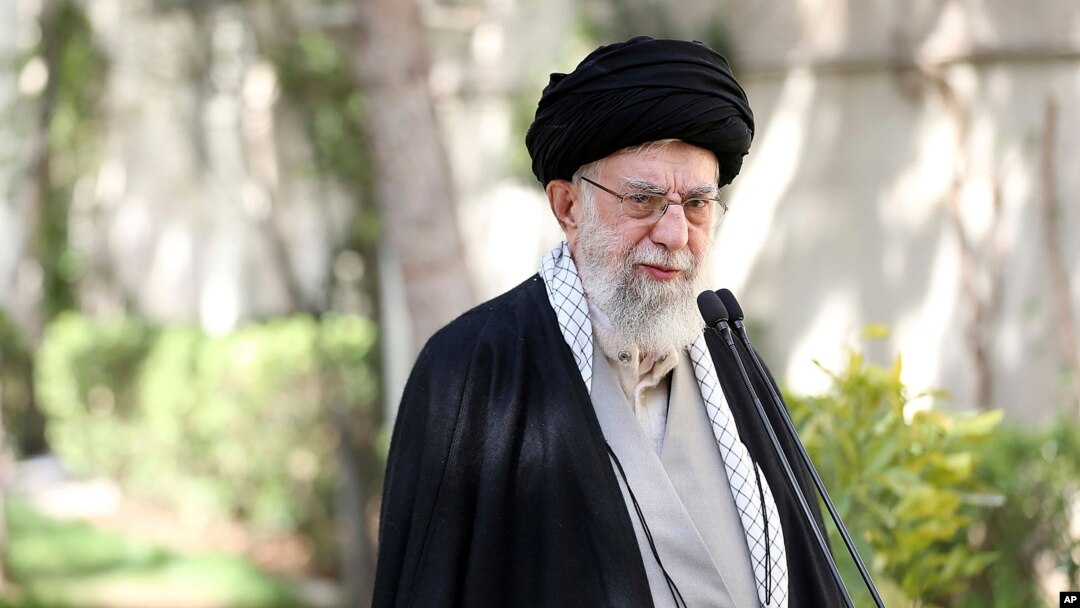 In this picture released by the official website of the office of the Iranian supreme leader, Supreme Leader Ayatollah Ali Khamenei speaks after planting a tree near his office, March 6, 2023. He said the recent poisoning of Iranian schoolgirls was an "unforgivable" crime. 