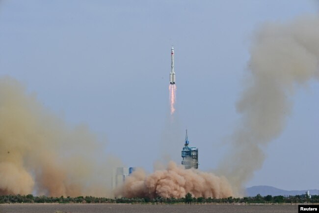FILE - A Long March-2F carrier rocket, carrying the Shenzhou-16 spacecraft and three astronauts, takes off from the launching area of Jiuquan Satellite Launch Center on May 30, 2023. (China Daily via REUTERS)