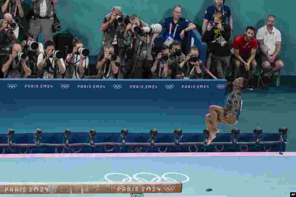 Simone Biles of United States performs on the beam during a women&#39;s artistic gymnastics qualification round at the 2024 Summer Olympics in Paris, France.