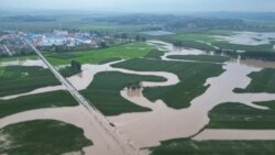 Tens of Thousands Evacuated from Massive China Floods