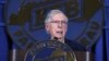 FILE - U.S. Senator Mitch McConnell speaks at the Kentucky Farm Bureau's annual Country Ham Breakfast at the Kentucky State Fair in Louisville, Kentucky, Aug. 24, 2023. (Michael Clevenger/Courier Journal via AP)