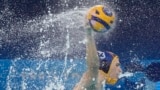Spain's Alvaro Granados Ortega shoots to score during a men's water polo Group B preliminary match between Serbia and Spain, at the 2024 Summer Olympics, Aug. 1, 2024, in Saint-Denis, France. 
