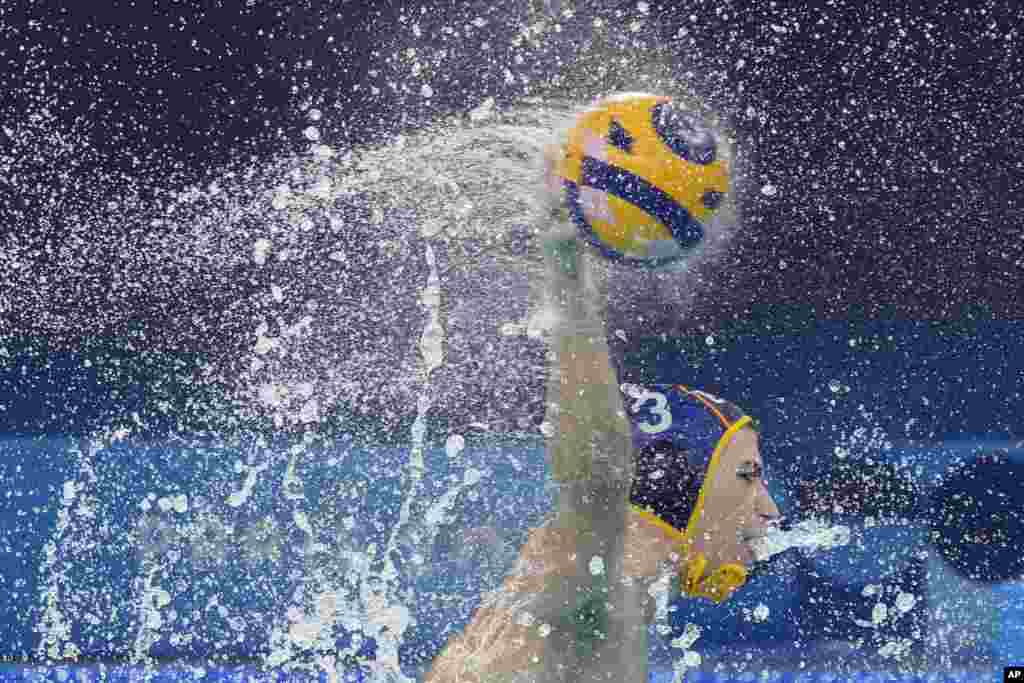 Spain&#39;s Alvaro Granados Ortega shoots to score during a men&#39;s water polo Group B preliminary match between Serbia and Spain at the 2024 Summer Olympics in Saint-Denis, France.