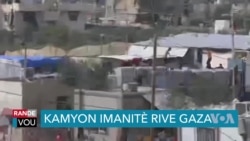 Popilasyon nan Gaza a Piye kamyon ki t ap Transpòte Asistans Imanitè