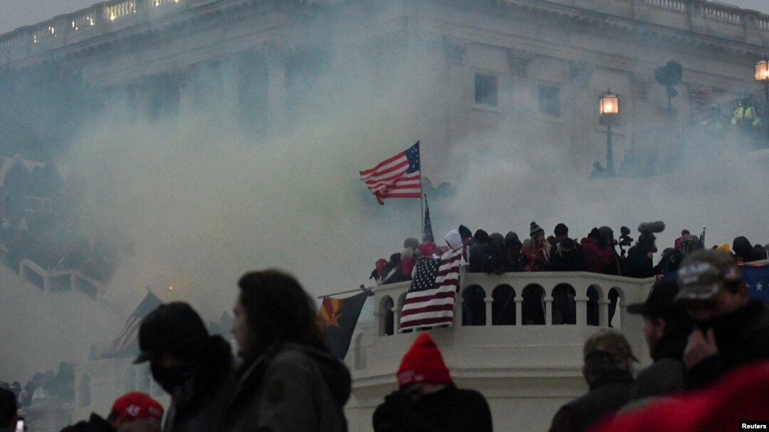 FILE - More than 500 have pleaded guilty to federal charges, while dozens have been convicted at trial in connection to the Jan. 6, 2021, assault on the U.S. Capitol in Washington. The FBI says it is seeking information about more than 260 others suspected of committing violence.