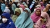 FILE - Relatives of victims take part in an event to commemorate the 19th anniversary of the 2004 'Tak Bai Massacre,' when scores of protesters suffocated to death in army trucks, in Tak Bai, in Thailand's Narathiwat province, Oct. 25, 2023.