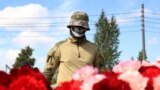 A fighter of Wagner private mercenary group visits a makeshift memorial near former PMC Wagner Centre, associated with the founder of the Wagner Group, Yevgeny Prigozhin, in Saint Petersburg, Russia.