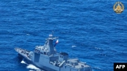 This handout photograph shows BRP 'Antonio Luna' participating in the first Multilateral Maritime Cooperative Activity between the Philippines, U.S., Australia and Japan, in South China Sea, April 7, 2024. (Photo by Armed Forces of the Philippines) 