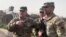 U.S. Joint Chiefs Chair Army General Mark Milley speaks with U.S. forces in Syria during an unannounced visit, at a U.S. military base in northeast Syria, March 4, 2023.