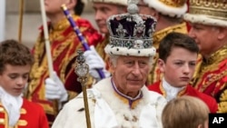 Britain's King Charles III departs Westminster Abbey after his coronation ceremony in London, May 6, 2023.