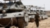 کاروانی از تانک‌های نظامیان اسراییلی در نزدیک مرز جنوبی غزه با اسراییل