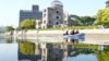 Police officers patrol the river near the Atomic Bomb Dome as Japan's police beef up security ahead of the Group of Seven nations' meetings in Hiroshima, Japan, May 17, 2023. 