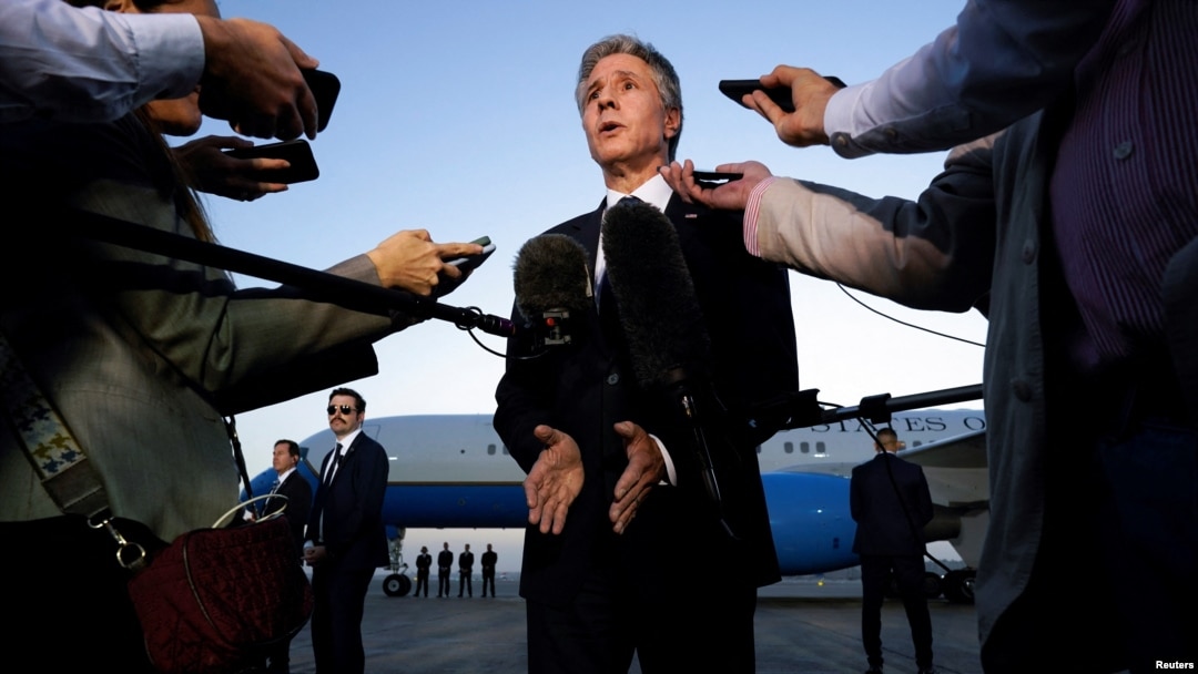 U.S. Secretary of State Antony Blinken speaks to members of the media before leaving Cairo, Egypt, Oct. 15, 2023, for Jordan.