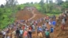 People are seen gathered at the site of a landslide in Gofa Zone, southern Ethiopia, July 22, 2024. (Isayas Churga/Gofa Zone Government Communication Affairs Department via AP)