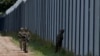 Poland bolstering its border with Belarus to deter illegal migration