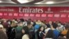People queue at a flight connection desk at the Dubai International Airport, after flooding in Dubai, United Arab Emirates, April 17, 2024. 