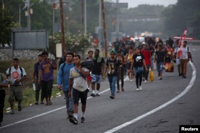 En Fotos Migrantes en caravana se cosen los labios en protesta