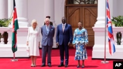 Britain's King Charles III, center left, and Queen Camilla, left, pose for photo with Kenya's President William Ruto and First Lady Rachel Ruto ahead of their meeting at State House in Nairobi, Kenya, Oct. 31, 2023.