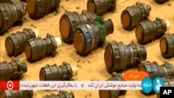 This frame grab from video footage released Aug. 31, 2023, by Iranian state television's IRINN network shows what officials described as faulty foreign parts that could be used in a missile or a drone.