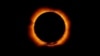 FILE - Photo of an annular solar eclipse taken by the solar optical telescope Hinode as the moon came between it and the sun. (JAXA/NASA)