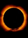 FILE - Photo of an annular solar eclipse taken by the solar optical telescope Hinode as the moon came between it and the sun. (JAXA/NASA)