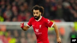 FILE - Liverpool's Mohamed Salah controls the ball during the English Premier League soccer match between Liverpool and Manchester United at the Anfield stadium in Liverpool, England on Sunday December 17, 2023.