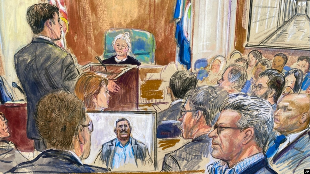 FILE - This artist sketch depicts Salah Al-Ejaili, foreground right with glasses, before the U.S. District Court in Alexandria, Virginia, April 16, 2024.