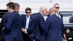 President Joe Biden walks to board Air Force One at Harry Reid International Airport in Las Vegas, Nevada, July 17, 2024. Biden has tested positive for the coronavirus, according to the White House.