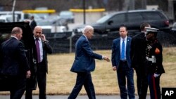 President Joe Biden leaves Walter Reed National Military Medical Center in Bethesda, Md., Feb. 16, 2023. The results of the 80-year-old's annual health exam, released the same day, describe him as "healthy" and "fit to successfully execute the duties of the Presidency."