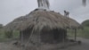 FILE - A teenager works on the roof of his house as Storm Freddy is due to hit Mozambique again, in the Nicoadala district, near Quelimane, Mozambique, March 10, 2023. (UNICEF Mozambique/2023/Alfredo Zuniga/Handout via Reuters)