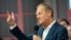 Donald Tusk, a former Polish prime minister addresses supporters at his party headquarters in Warsaw, Poland, Oct. 15, 2023. 