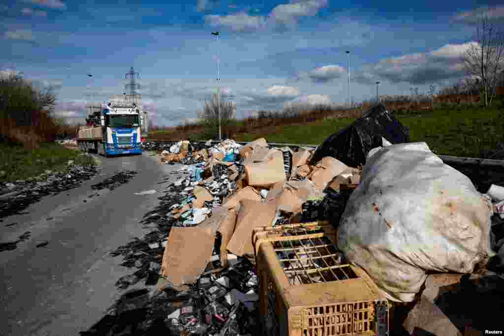 450 tons of waste are piled up on a slip road of the A104 motorway, close to a site of the Paris 2024 Olympic and Paralympic Games, in Villepinte, near Paris, France. REUTERS/Benoit Tessier