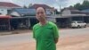 FILE - This photo from a source wishing to remain anonymous shows Chinese rights lawyer Lu Siwei on a road, at an undisclosed location, around 300 kilometers north of Vientiane, Laos, on July 27, 2023, as he headed south to the border with Thailand.
