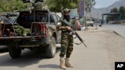 An Afghan Taliban forces soldier stands guard near the Torkham border crossing in Afghanistan's Nangarhar province, Aug. 13, 2024.