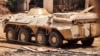 A Sudanese armed forces' (SAF) armored personnel carrier (APC) is pictured in southern Khartoum amidst ongoing fighting on June 7, 2023. 