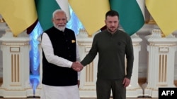 Primeiro-ministro indiano, Narendra Modi, e Presidente da ucraniano Volodymyr Zelenskyy.