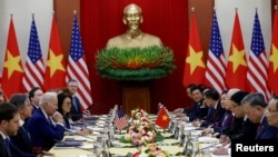U.S. President Joe Biden attends a meeting with Vietnam's Communist Party General Secretary Nguyen Phu Trong, at the Communist Party of Vietnam Headquarters in Hanoi, Sept. 10, 2023.