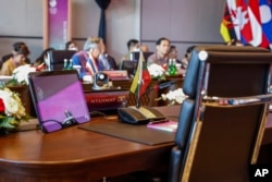 The desk reserved for a Myanmar delegate is left unoccupied during the Association of Southeast Asian Nations Foreign Ministers' meeting ahead of the 42nd ASEAN Summit in Labuan Bajo, East Nusa Tenggara, Indonesia, May 9, 2023.