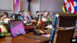 The desk reserved for a Myanmar delegate is left unoccupied during the Association of Southeast Asian Nations (ASEAN) Foreign Ministers' Meeting ahead of the 42nd ASEAN Summit in Labuan Bajo, East Nusa Tenggara, Indonesia, May 9, 2023. 