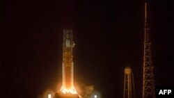FILE — The Artemis I unmanned lunar rocket lifts off from launch pad 39B at NASA's Kennedy Space Center in Cape Canaveral, Florida, Nov. 16, 2022. The U.S. is delaying returning astronauts to the surface of the moon, NASA said Tuesday. 