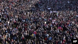 People across Iceland gather during the women's strike in Reykjavik, Oct. 24, 2023. 