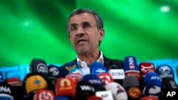 Iran's former President Mahmoud Ahmadinejad speaks in a press briefing after registering his name as a candidate for the June 28 presidential election at the Interior Ministry, in Tehran, Iran, June 2, 2024.