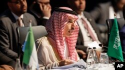 Saudi Arabia's Foreign Minister Faisal bin Farhan Al Saud attends a meeting during the 2023 BRICS Summit in Johannesburg, Aug. 24, 2023.
